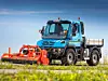 Mercedes Unimog mit Mähaufsatz