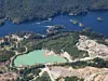 Aerial view of mining industry near Sechelt Inlet during a vibrant sunny day. Located in Sunshine Coast, BC, Canada.