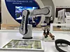 Cobot, Messe, Handhabung kleiner Figuren