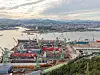 View of the colorful shipyard ocean port and harbor from the Ulsan bridge Observatory in Ulsan South Korea during a golden sunset