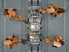 Assembly line of robots welding car body
