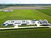 Batteries for energy storage in an open field, Holland