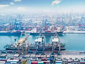Tanjung Priok industrial port at misty morning