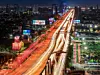 Expressway arial view during night with light trail, Bang Na, Bangkok Thailand