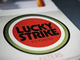 Viersen, Germany - May 9. 2020: Close up of pack Lucky Strike logo lettering vintage filter cigarettes