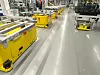 Materialfluss im Takt mit koordiniertem Zusammenspiel von AGVs und AMRs